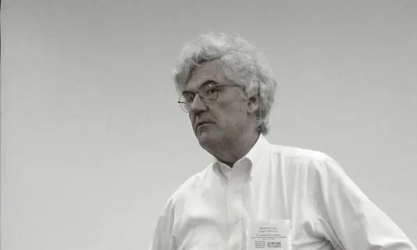 Michael Crew standing in front of a classroom