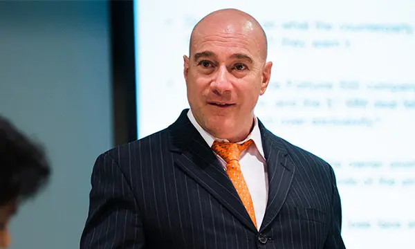Professor Ben Sopranzetti in class with executive education students