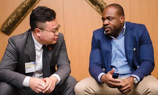 student and mentor talking