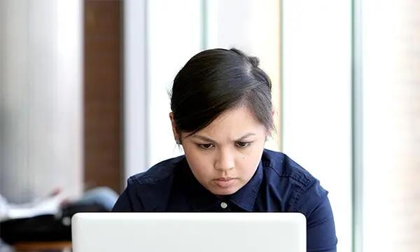 Student sitting at computer