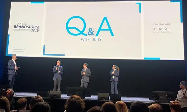 students presenting at l'oreal case competition
