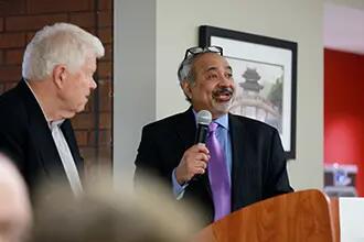 faculty member giving a speech