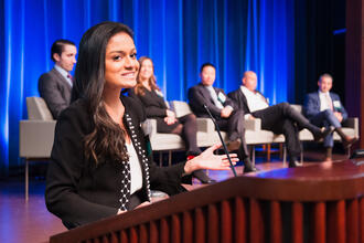 student speaking at libor event