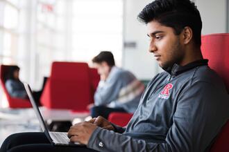 student using laptop