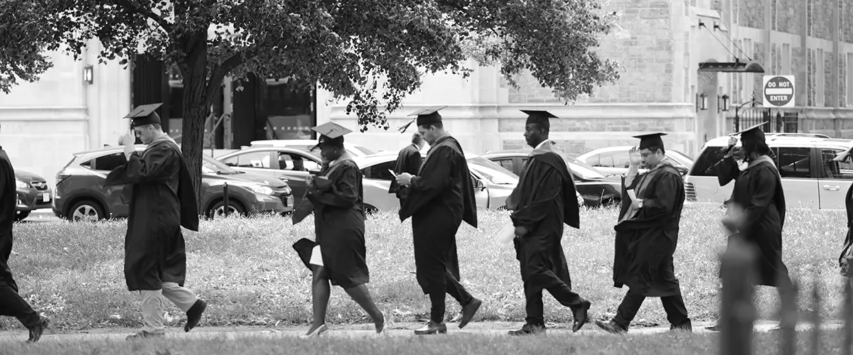 graduates walking to the graduation ceremony at NJPAC