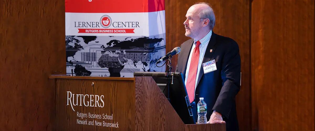 Christopher Molloy speaks at a center event