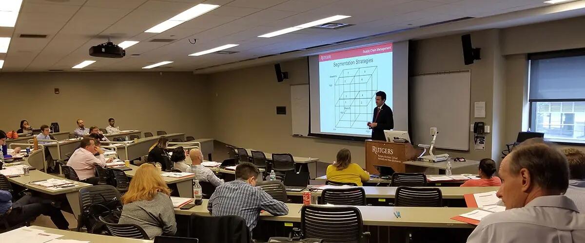 Professor Rudi Leuschner in class with students of the center.