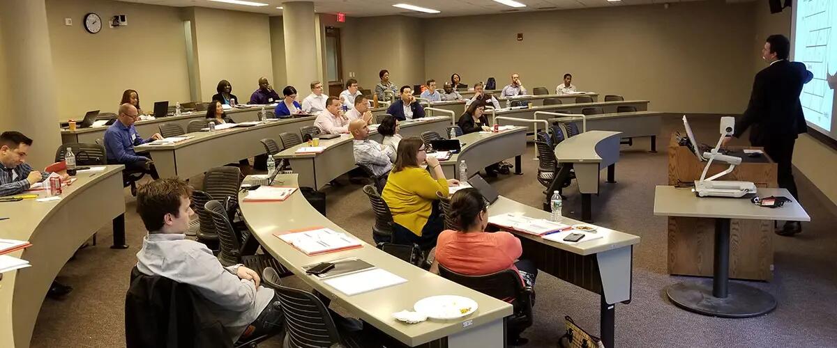 Professor Rudi Leuschner in class with students of the center.