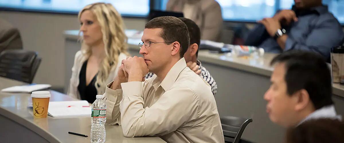 EMBA students in class