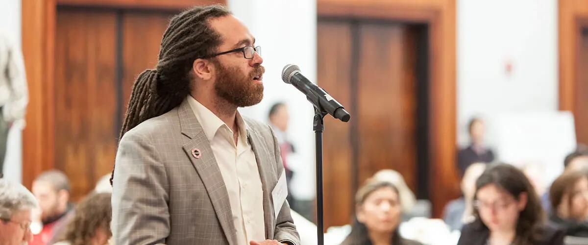 Person speaks at Institute for Ethical Leadership event. 