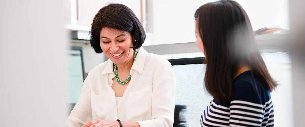Ph.D. student works with faculty adviser.