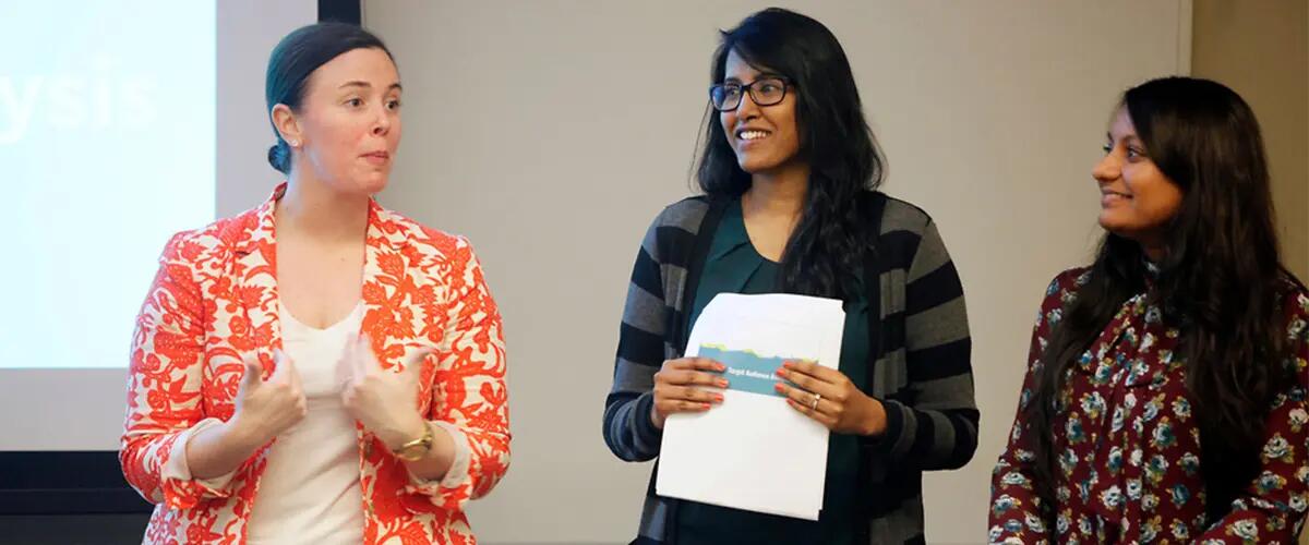 Rutgers graduate students presenting in class.