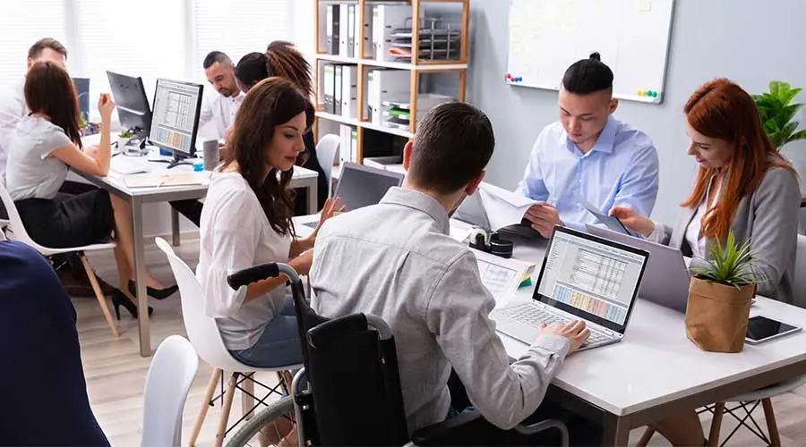 Diverse team collaborating at work.